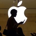 Apple, facing tariffs on Chinese imports, says it will invest $500 billion in US facilities