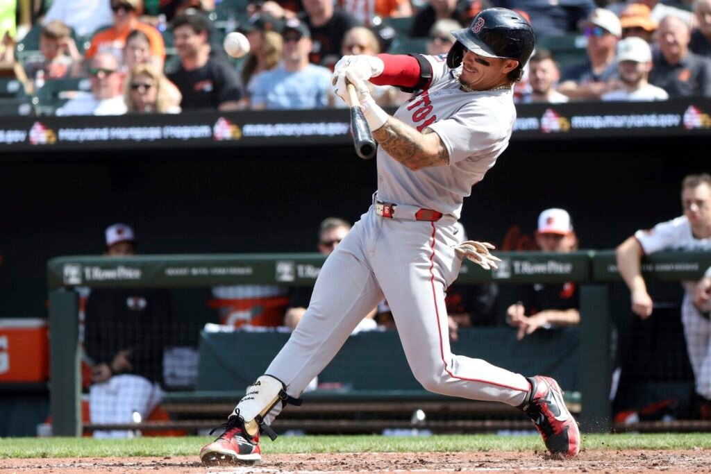 Boston Red Sox outfielder Jarren Duran lines out during the seventh inning of a baseball game against the Baltimore Orioles, Thursday, April 3, 2025, in Baltimore. (AP Photo/Daniel Kucin Jr.)