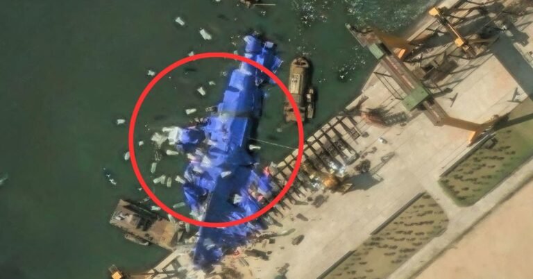 North Korea deploys mystery balloon-like objects to stricken warship, satellite photos show
