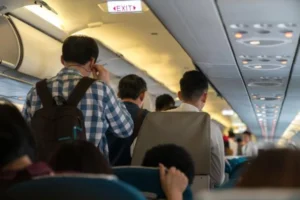 Stand up on the plane too early You could be risking a fine