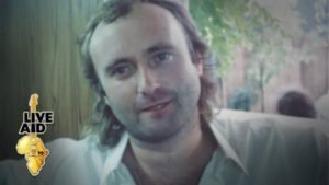 Phil Collins jetted across the ocean to perform in two Live Aid concerts, but it wasn’t without drama